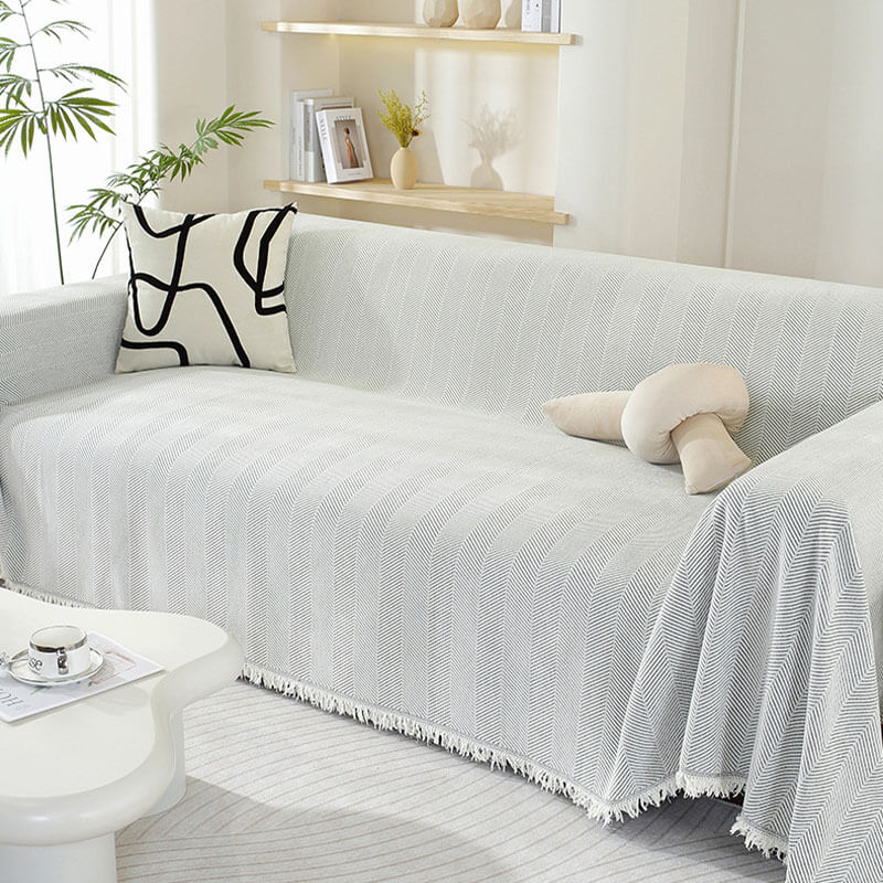 Sofaüberwurf mit Quasten | Gemütliches Design
